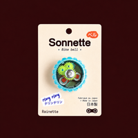 Sonnette de vélo bleue Tokyo Bell sur son packaging Rainette
