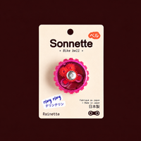Sonnette de vélo rose Tokyo Bell sur son packaging Rainette